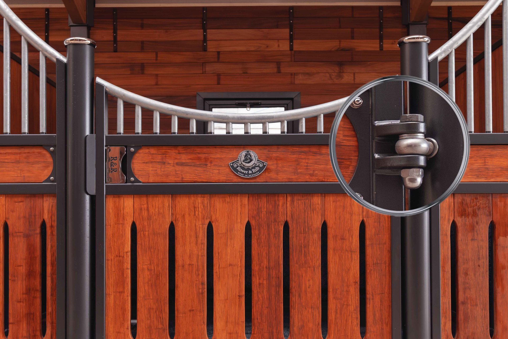 Secure horse stall door with solid and rounded pivot point